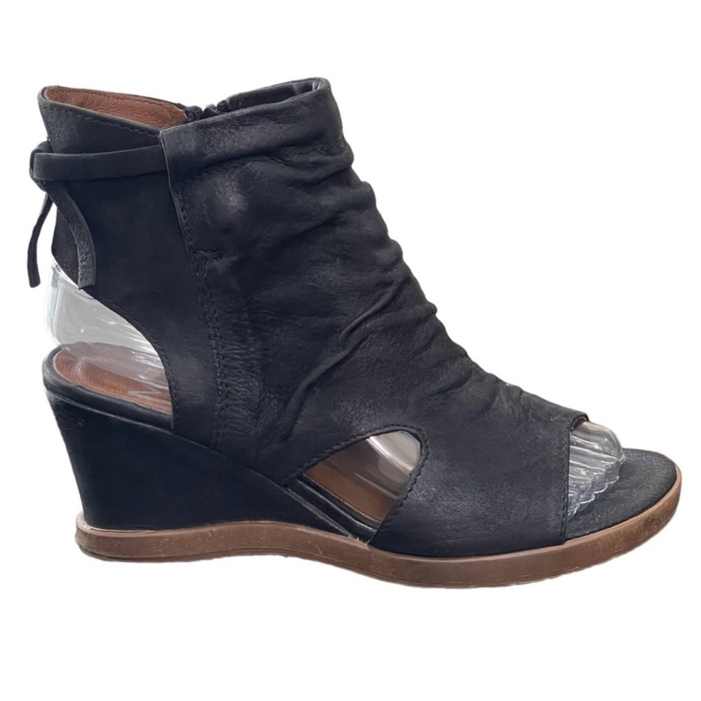 Miz Mooze black leather sandals.